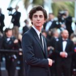 "How tall is Timothée Chalamet and could elevator shoes enhance his red carpet presence?"