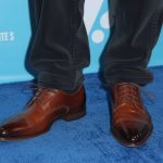 How tall is Zac Efron and do elevator shoes contribute to his red carpet confidence?