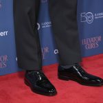 How tall is Andrew Garfield and could elevator shoes enhance his red carpet style?